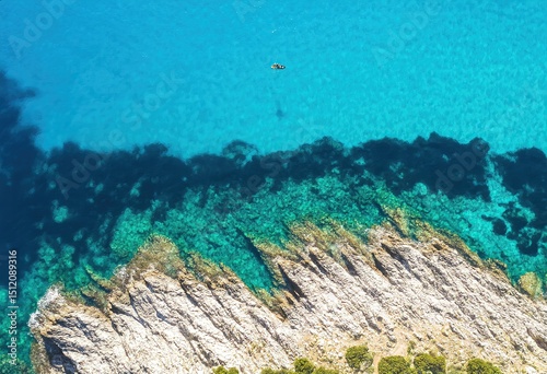 Clear Blue Sea and Rocky Shore