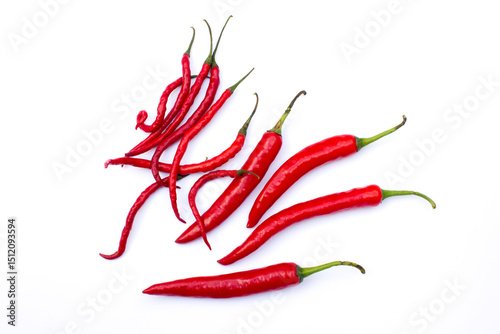 Fototapeta Naklejka Na Ścianę i Meble -  Fresh red chillies and red curly chillies isolated on white background.