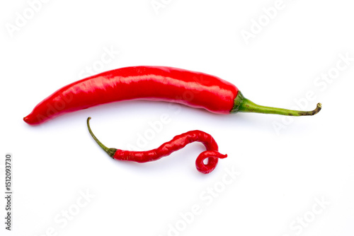 Fototapeta Naklejka Na Ścianę i Meble -  A fresh red chilli and red curly chilli isolated on white background.