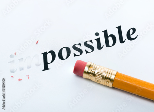 Word impossible and pencil with eraser close-up