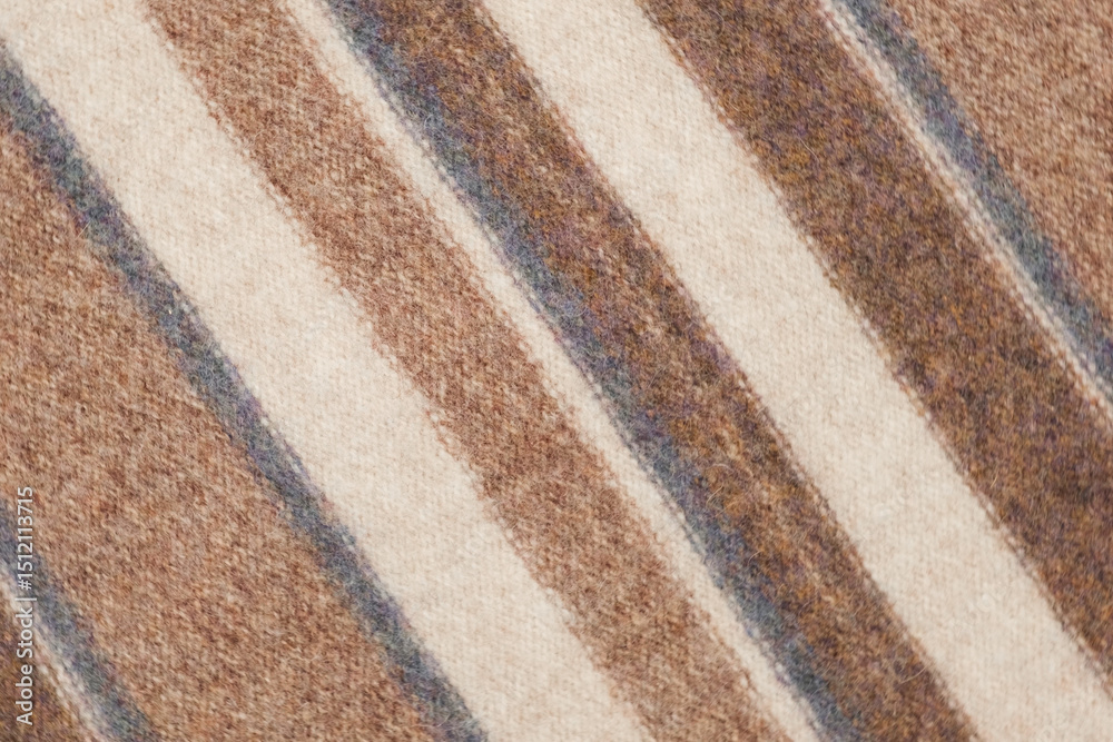 Fototapeta premium Soft Knitted Woolen Detailed Texture. Natural Fabric Closeup Knit Pattern. Striped Knitwear, Warm Cashmere Surface. Rotation, Macro. Cozy Textile Background. Clothes Production. Melange Yarn. 4K Shot