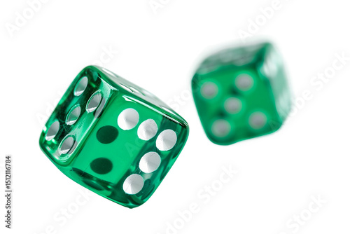 Pair of vibrant green dice rolling dynamically isolated on transparent background