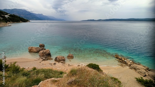 Fototapeta Naklejka Na Ścianę i Meble -  Travel vacation Destination in Mimice, Croatia with Pristine Beach, Natural Rock Formations and Turquoise Sea, Scenic Seaside View, Serene Adriatic Coastline and Hidden Beach