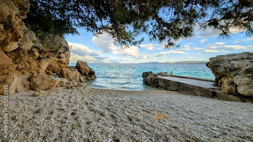 Fototapeta Naklejka Na Ścianę i Meble -  Travel vacation Destination in Mimice, Croatia with Pristine Beach, Natural Rock Formations and Turquoise Sea, Scenic Seaside View, Serene Adriatic Coastline and Hidden Beach