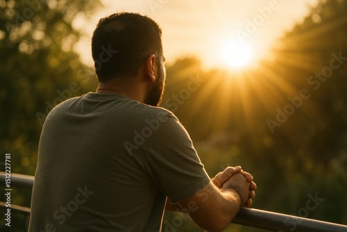 Fototapeta Naklejka Na Ścianę i Meble -  Contemplative man sunset view