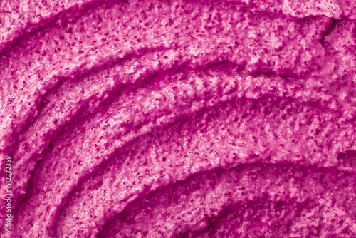 Purple berry yogurt ice cream. Fresh fruit and berry smoothie currant, pitaya, fig, grape, plum. Ice cream texture. Delicious sweet dessert close-up as background.