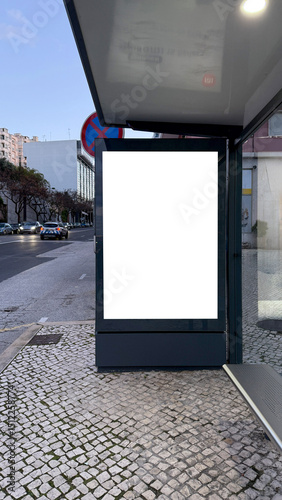 Vacant urban billboard glowing under twilight, ripe for avant-garde art, guerrilla poetry, or Transit Revolution Day musing