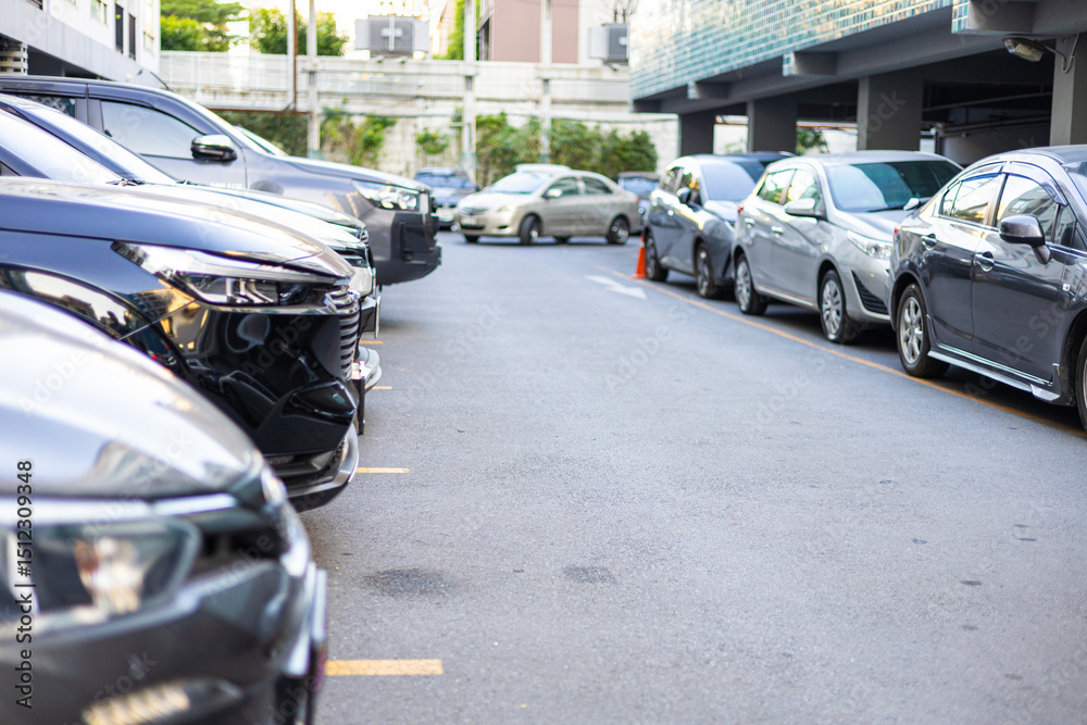 Fototapeta premium Front view of car parking lot outdoor parking in resident