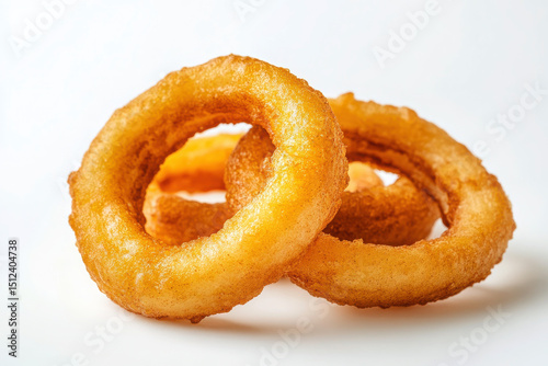 Close-up of golden brown onion rings isolated on a white background for a crispy and appetizing look