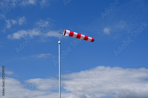 windsock in the colours red white striped