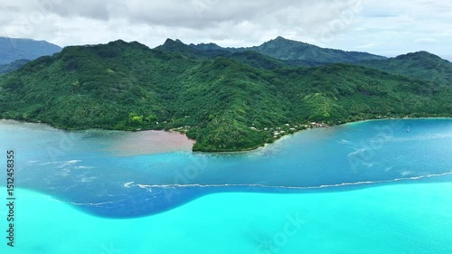 Drone Tahiti. Aerial view of Huahine island lagoon, coastal landscape. Crystal clear blue water. Exotic travel vacation, romantic honeymoon, tourism destination in French Polynesia. 