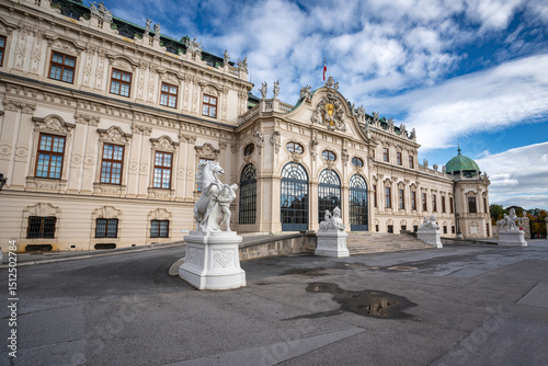 Close-up view of Belveder Palace in Vienna, Austria, with the surrounding monuments in the foreground, capturing the intricate architectural details