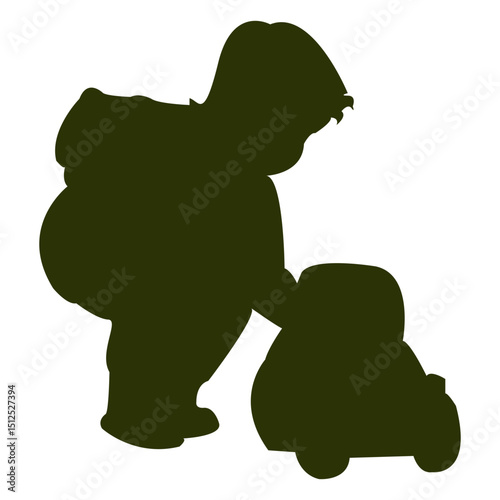 Boy playing with tricycle