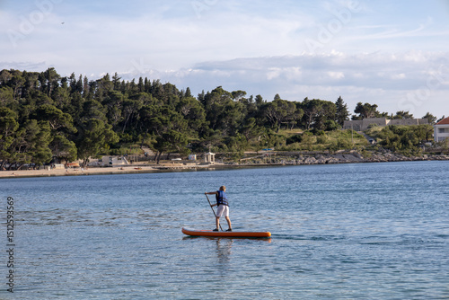 Fototapeta Naklejka Na Ścianę i Meble -  Amazing Makarska beach with boats against adriatic sea in Makarska Riviera, Dalmatia