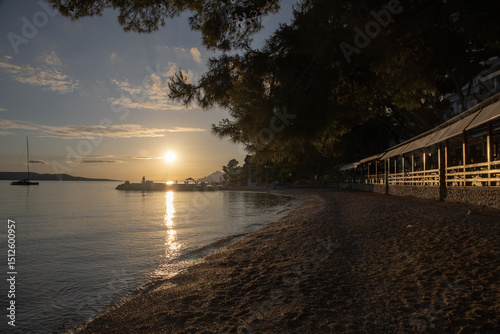 Fototapeta Naklejka Na Ścianę i Meble -  Amazing Makarska beach with boats against adriatic sea in Makarska Riviera, Dalmatia