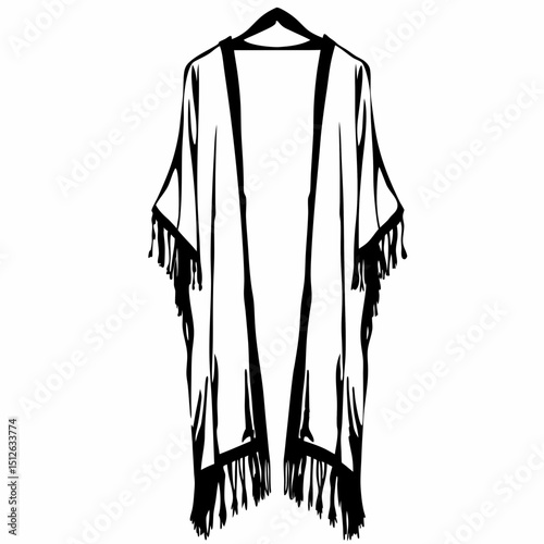 Stylish fringed kimono in black and white hanging on a hanger  