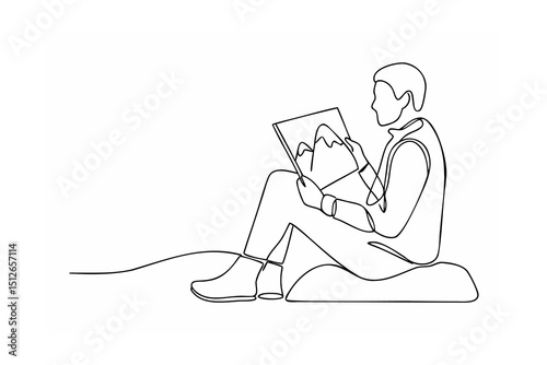 Man sitting on cushion viewing mountain landscape drawing