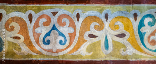 Painted with floral pattern vaulted ceiling of the medieval orthodox church	