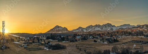 Tatra mountains peak at sunrise seen from Murzasichle village. Winter in Polish mountain region