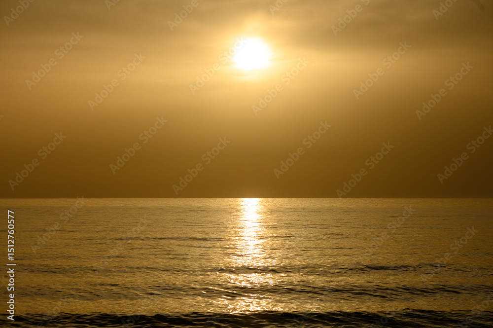 Obraz premium Sunset on the Mediterranean Sea Shore in Cyprus