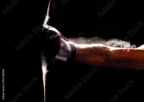 Boxer training with a punching bag.