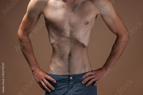 Konstfotografi Man suffering from anorexia on beige background, closeup