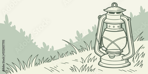 Lantern resting on grassy hill in a tranquil outdoor setting during early evening light