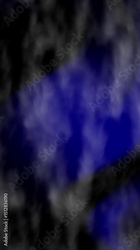 Black and white smoke against a blue background, artistic and striking imagery perfect for design projects and creative concepts. Bold and dramatic visual impact for various uses.