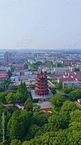 4k real time Aerial view of beautiful ancient tower on sunny day in Pudong new area, Shanghai.