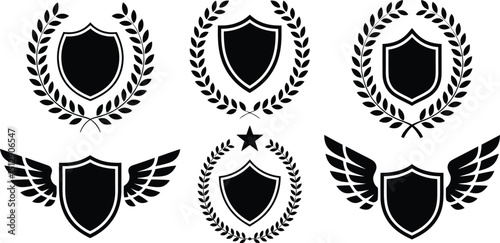 Various black heraldic shields with laurel wreaths and wings on a white background in a vector format