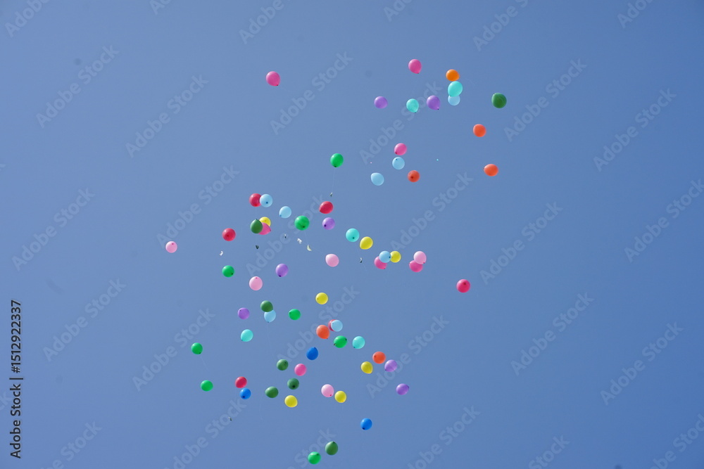 Colorful Balloons Floating in a Clear Blue Sky A Celebration of Joy and Freedom Colorful Balloons Floating in a Clear Blue Sky A Celebration of Joy and Freedom