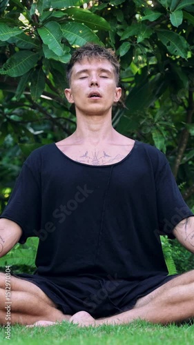 Yoga Meditation and Breathing of Handsome Man Enjoying Pilates in Green Park. Mental Health of One Fit Yogi Inhaling and Praying Looking at Camera. Modern Freedom of Mind for Guy Gesturing Namaste