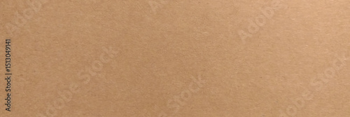 Brown recycled paper background, texture close-up. Recyclable material stock photo. 