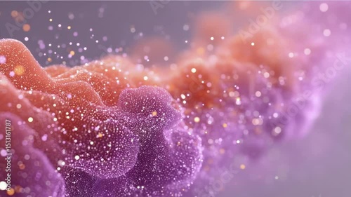 Abstract particle animation with color gradient creates a dreamy flowing background.
