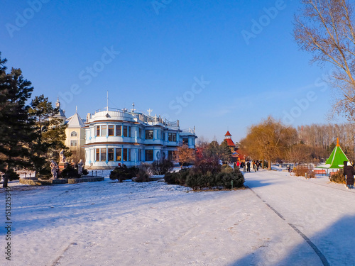Volga manor, Russian village theme park with classic Russian architecture on a beautiful sunny winter day with a blue-sky, in Harbin, China 
