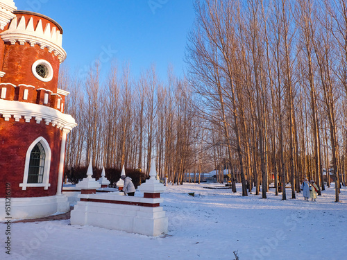 Volga manor, Russian village theme park with classic Russian architecture on a beautiful sunny winter day with a blue-sky, in Harbin, China 