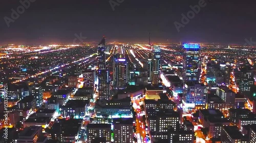 Wallpaper Mural Aerial view of city lights at night slowly transitioning into blurred defocused bokeh effect for abstract cinematic background Torontodigital.ca