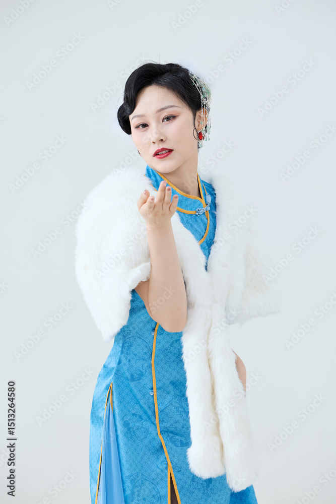 Beautiful dancer performing dance in Chinese cheongsam Beautiful dancer performing dance in Chinese cheongsam