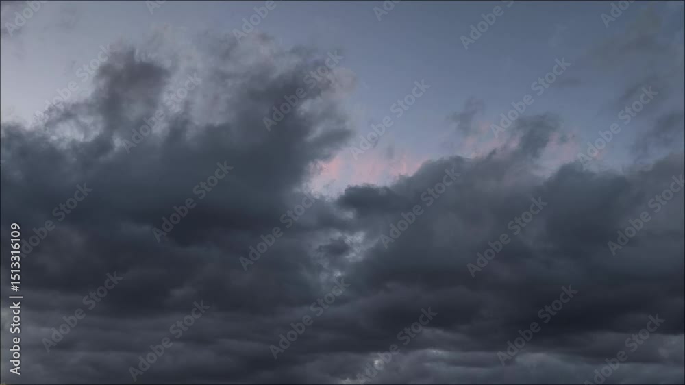 Clouds moving across the sky almost at night