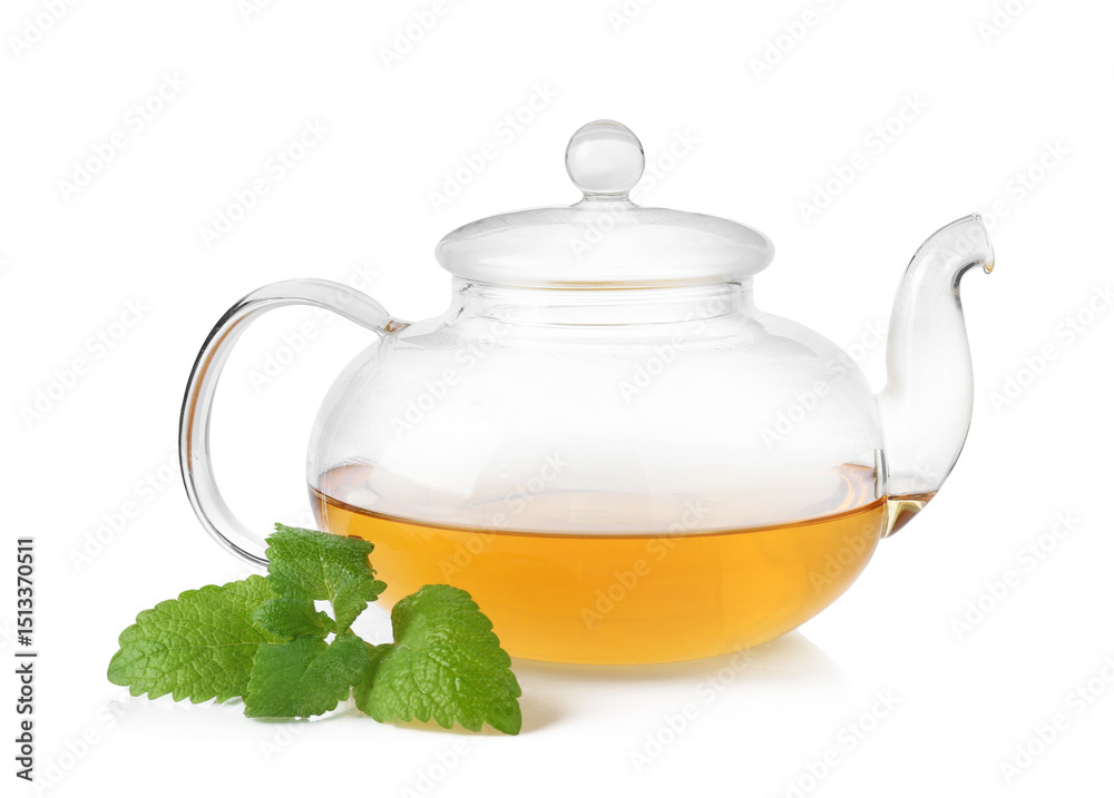 Naklejka premium Aromatic lemon balm tea in glass teapot and fresh leaves isolated on white