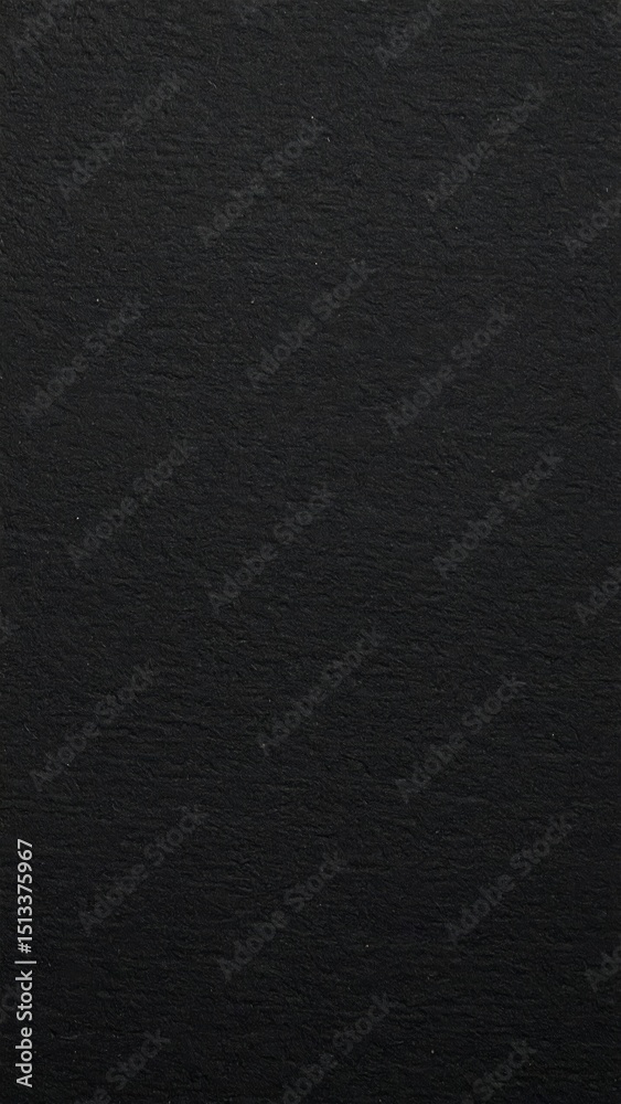 Fototapeta premium Black rough paper texture, close view paper pattern background