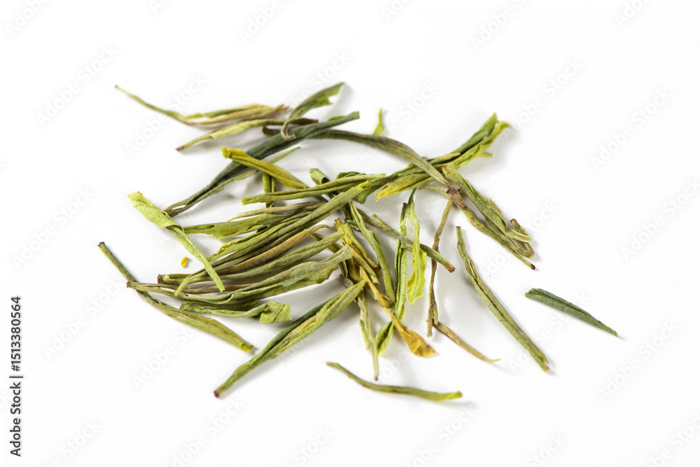 Fototapeta premium Dried green tea leaves isolated on white background.