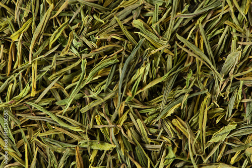 Tableau sur toile Dried green tea leaves texture background.