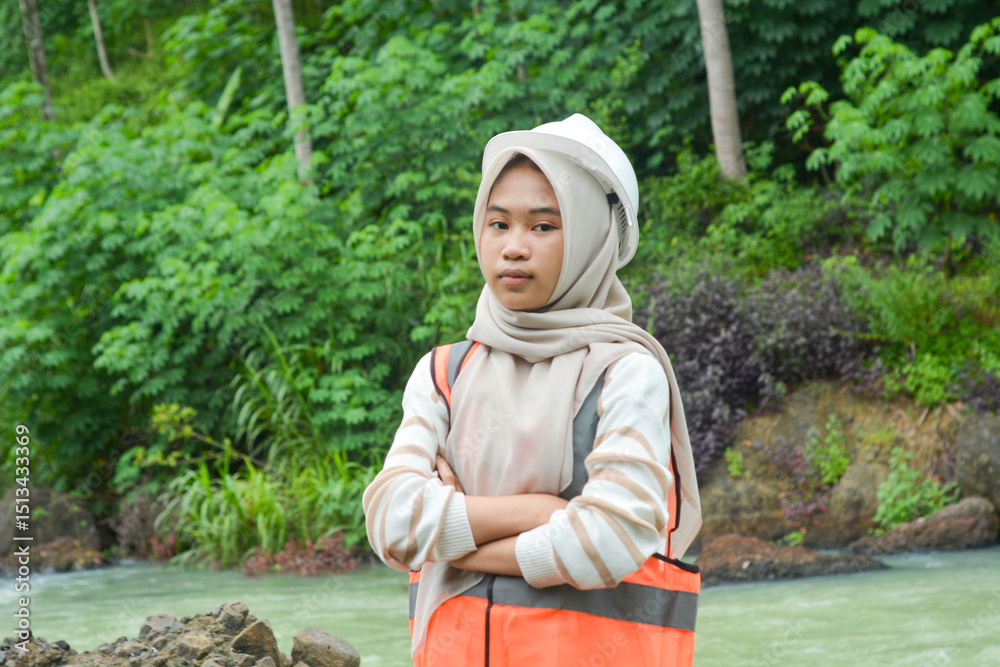 Obraz premium Maintenance woman engineer working at hydroelectric power plant. Renewable energy system.