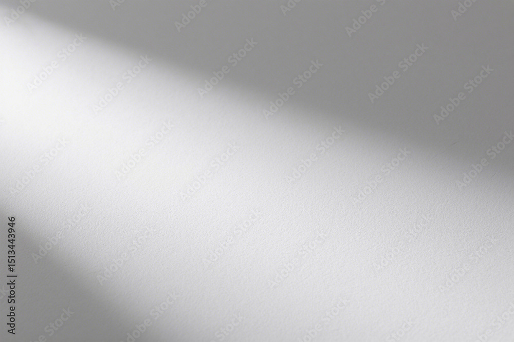 Obraz premium White wall with soft light and shadow creating a minimalist texture