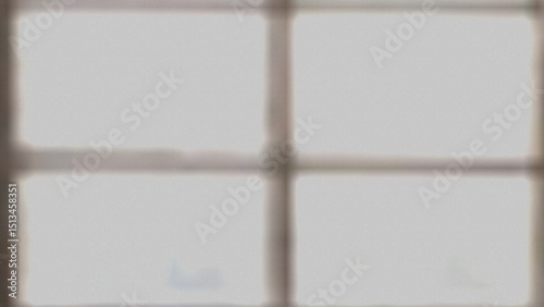 Canvastavla An out of focus photograph depicting a window divided into four panes by a dark frame