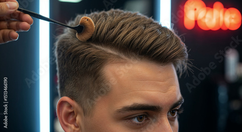 barber makes a hair