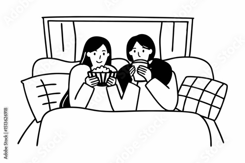 Young woman lesbian couple in sweater sitting on the comfortable sofa to watching cinema together in living room at home and eating delicious popcorn with drinking hot chocolate