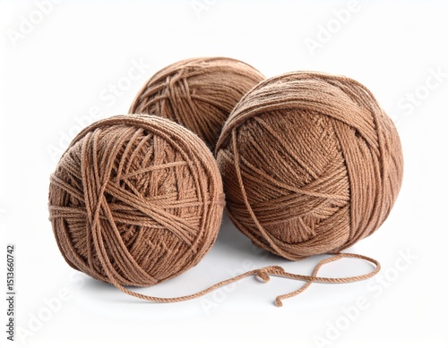 Soft brown woolen yarn isolated on white background  photo