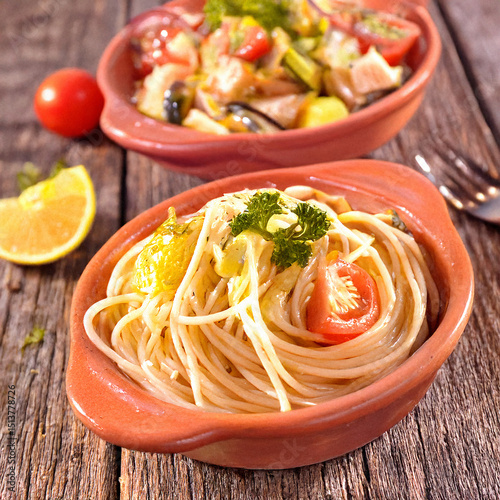 spaghetti with lemon and topped with basil